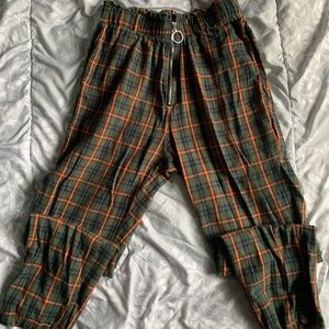 Exposed zip plaid peg pants